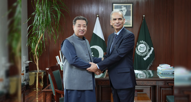 The Chief Election Commissioner Mr. Sikandar Sultan Raj shaking hand with the Wafaqi Mohtasib (Federal Ombudsman) Mr. Naveed Kamran Baloch on March 11th, 2026.